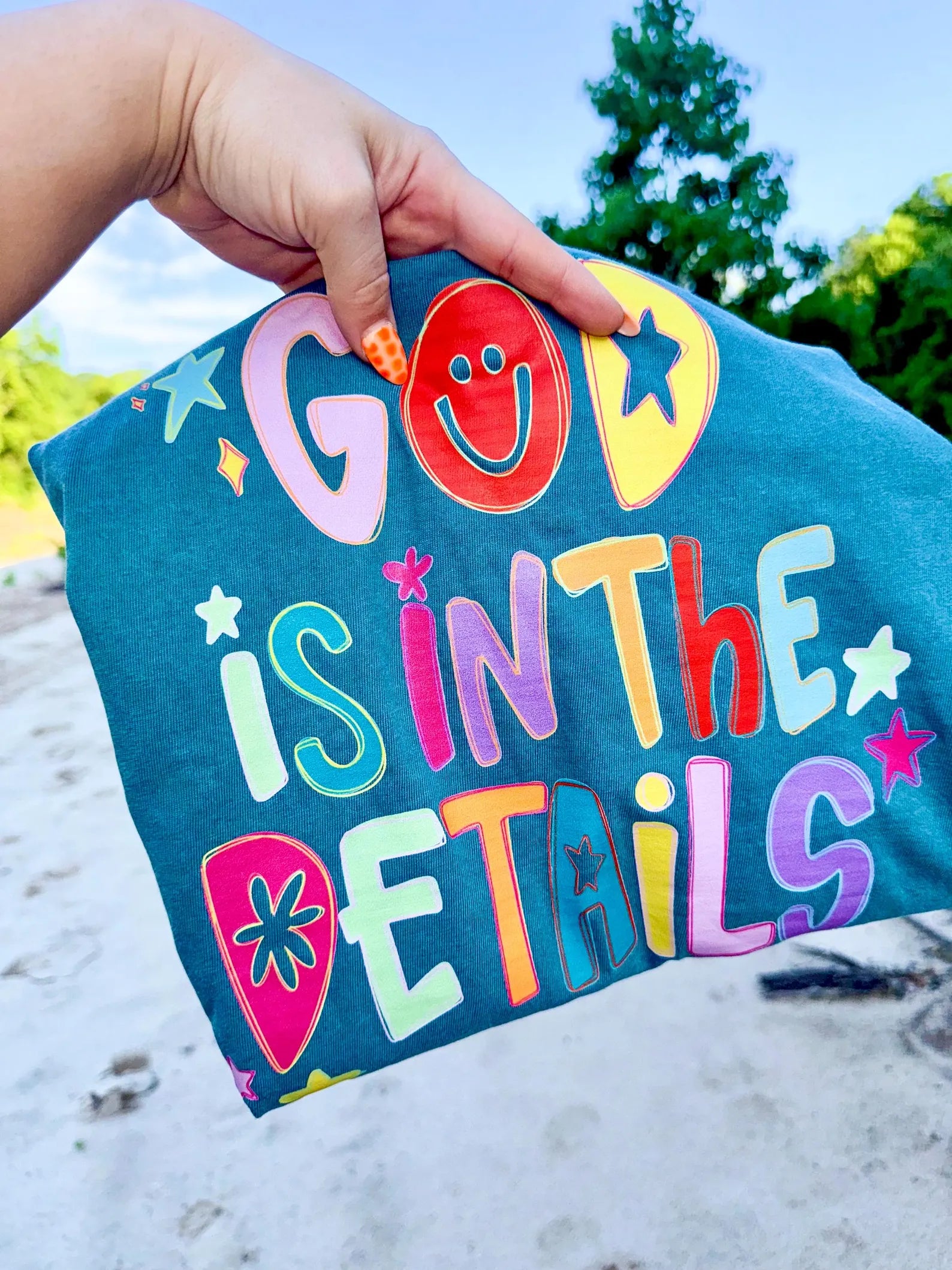 God Is In The Details Tee